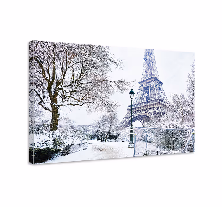 Turnul eiffel înzăpezit în orașul de iarnă imprimeuri pe pânză - TenStickers