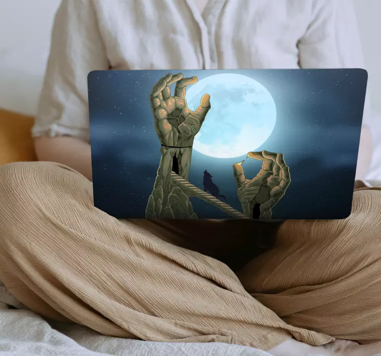 Autocolant pentru laptop mâini gigantice care țin luna - TenStickers