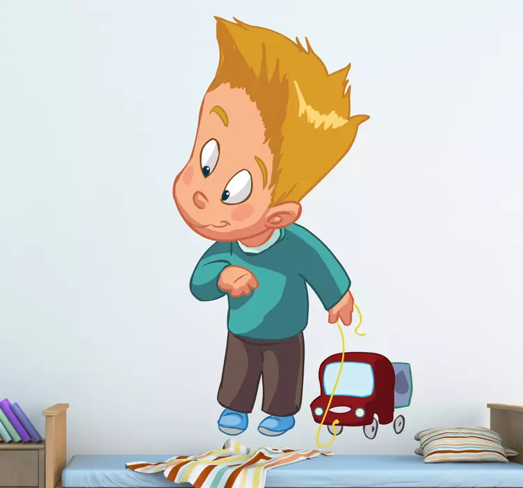 Copilul se joacă cu autocolantul de perete al jucăriei - TenStickers